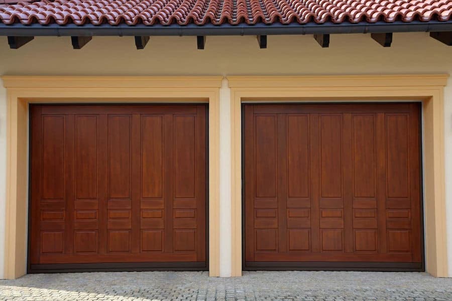 Double garage with wooden doors