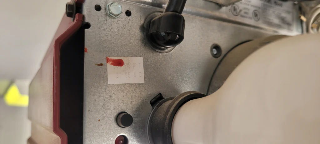 wiring connections, and the light socket assembly, identifying the key parts of a garage door opener